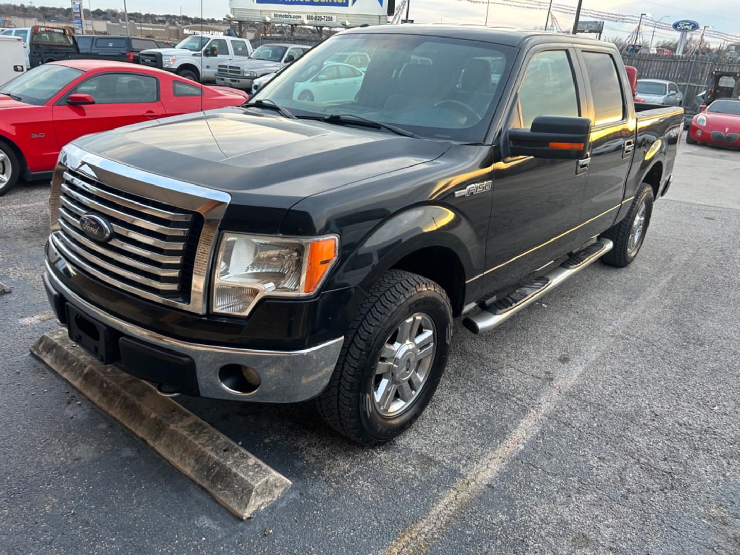 2012 Black Ford F-150 XL SuperCrew 5.5-ft. Bed 4WD (1FTFW1EF1CK) with an 5.0L V8 engine, 6-Speed Automatic transmission, located at 1687 Business 35 S, New Braunfels, TX, 78130, (830) 625-7159, 29.655487, -98.051491 - Photo#0